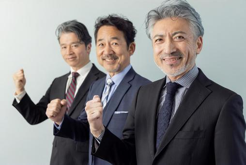 ガッツポーズをする男性ビジネスパーソン ガッツポーズをする男性ビジネスパーソン エグゼクティブ,ビジネスマン,ガッツポーズの写真素材