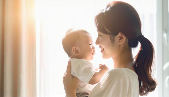 見つめ合う母親と赤ちゃん 見つめ合う母親と赤ちゃんの写真