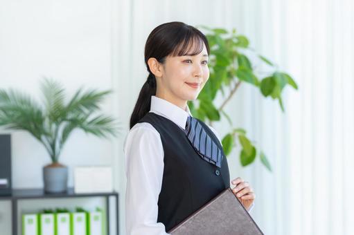 受付のビジネスウーマン 受付,女性,笑顔の写真素材