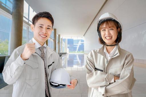 二人の笑顔の作業員 二人の笑顔の作業員 ゼネコン,作業服,作業員の写真素材