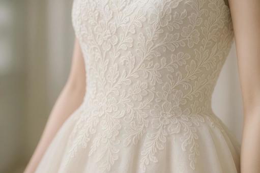 白いドレスのレースディテール 白いドレスのレースディテールの写真