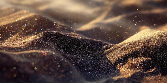 穏やかな光に包まれた砂漠の砂の写真