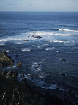レトロ風奄美大島の展望台からの海 レトロ風奄美大島の展望台からの海の写真