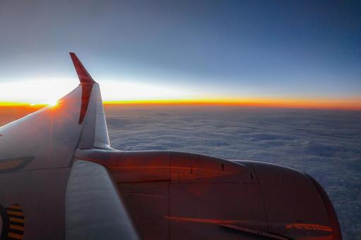 Sunset-colored passenger plane window view_side, JPG