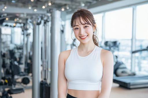 ジムでトレーニングする女性-9 ジムでトレーニングする女性-9の写真