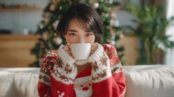 クリスマス　アグリーセーターを着た女性の写真