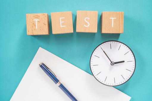 Test | Blocks with "TEST" written on them, clocks, paper and pens, test, test, examination, JPG