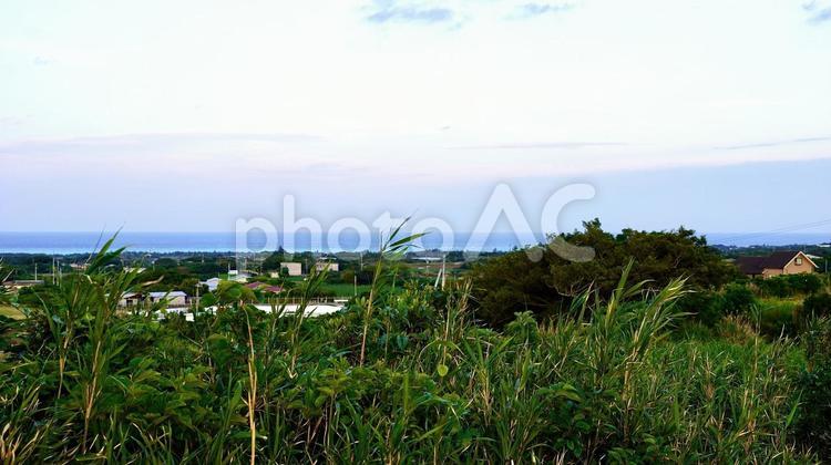 与論島舵引きの丘（ハジピキパンタ）の夕景 与論,ハジピキパンタ,舵引きの丘の写真素材