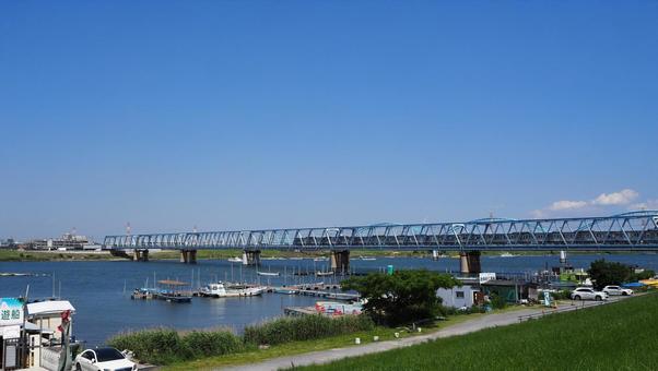 江戸川・東西線の鉄道橋・市川市妙典駅近郊 江戸川・東西線の鉄道橋・市川市妙典駅近郊 夏,江戸川,鉄道橋の写真素材