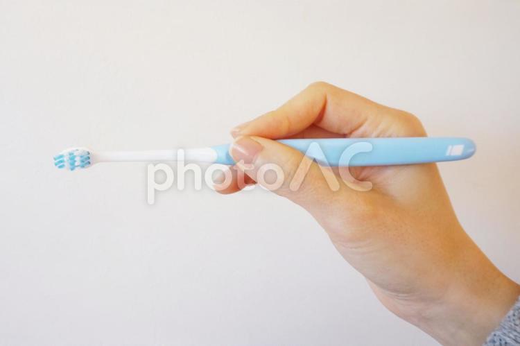 歯ブラシの正しい持ち方 ハミガキ,手,持ち方の写真素材