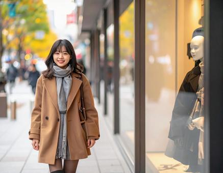 秋の彼女のウィンドウショッピング 秋の彼女のウィンドウショッピングの写真