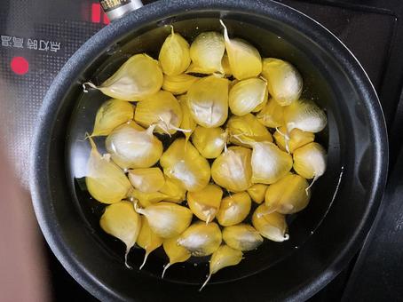 にんにく コンフィ,ガーリック,オリーブオイルの写真素材