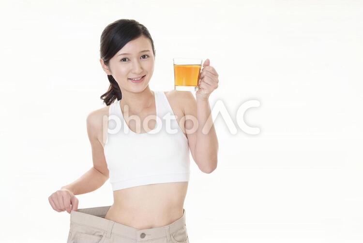 ダイエットに成功した女性 女性,女,健康の写真素材