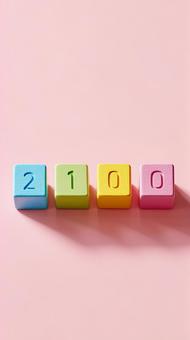 ピンク背景に並んだ2100年木製ブロック ピンク背景に並んだ2100年木製ブロックの写真