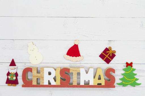 白木背景にCHRISTMASの文字と飾り クリスマス,アルファベット,飾りの写真素材