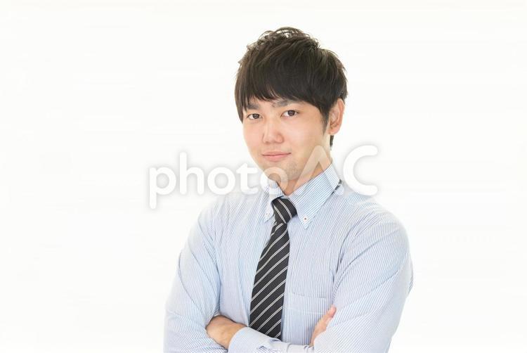 腕組みをする男性 男性,ビジネス,ビジネスマンの写真素材