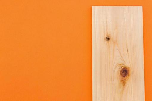 ヒノキの板　オレンジ背景 ヒノキ,板,材木の写真素材