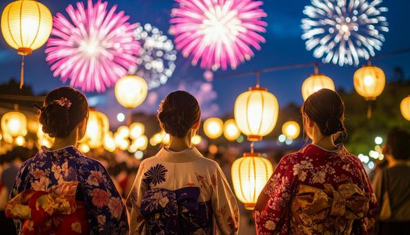 浴衣姿で夜空の花火を見ている日本の夏祭りの写真