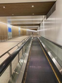 Moving walkway at Roppongi Station, JPG