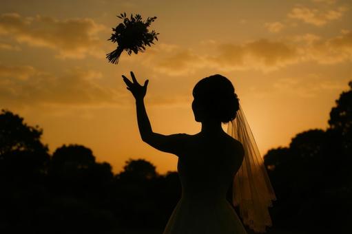 ブーケを投げる花嫁の影 ブーケを投げる花嫁の影の写真
