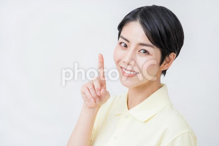 提案する介護士の女性。 介護,介護福祉士,介護士の写真素材