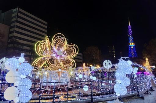 タワーと光の渦：札幌の冬の夜景 イルミネーション,ホワイトイルミネーション,札幌の写真素材