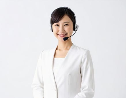 笑顔のオペレーター女性の写真