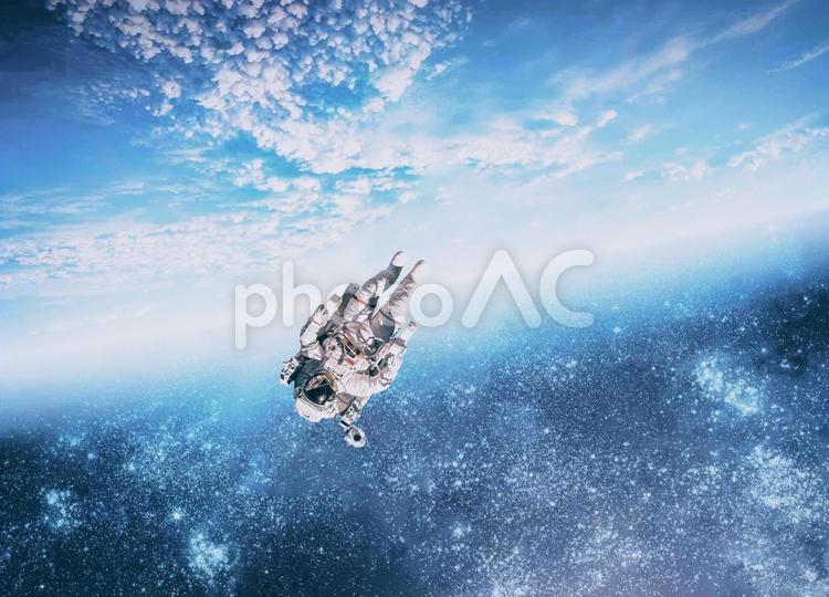 宇宙空間 宇宙,地球,宇宙遊泳の写真素材