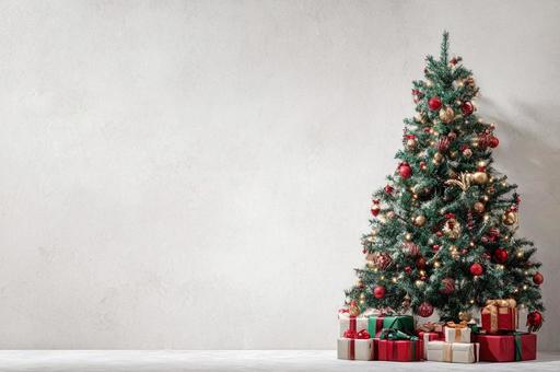 プレゼントが置いているクリスマスツリー プレゼントが置いているクリスマスツリーの写真