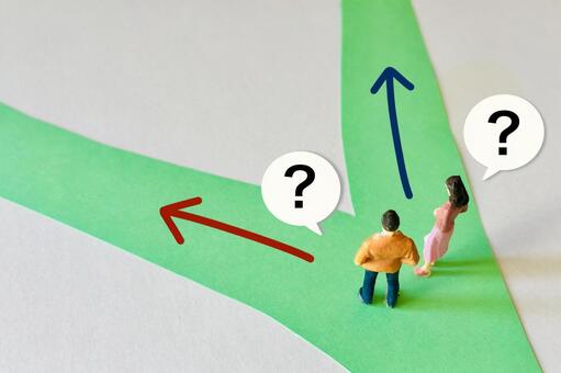 進路や岐路について悩む男女 考える,悩む,相談の写真素材