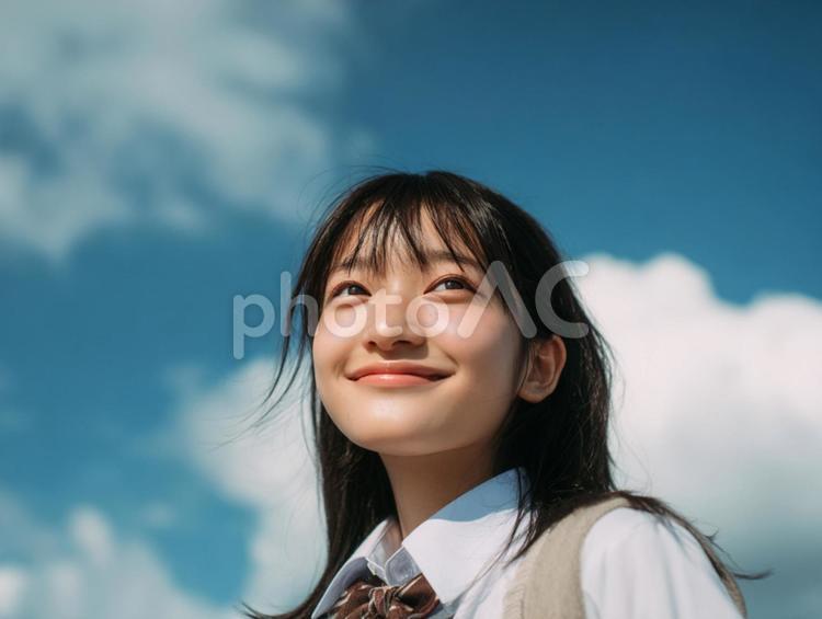 青空と学校の制服を着た女の子 女の子,制服,学校の写真素材
