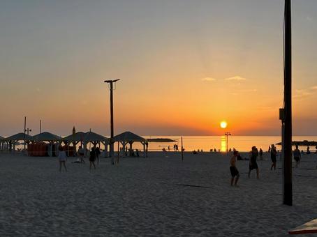 ビーチの夕日 ビーチの夕日の写真