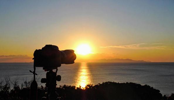 カメラと海と太陽 カメラと海と太陽の写真