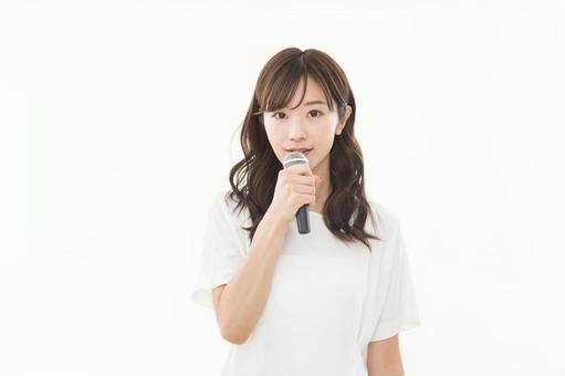 若い女性 マイク 若い女性 マイク 女性,セミナー,カラオケの写真素材