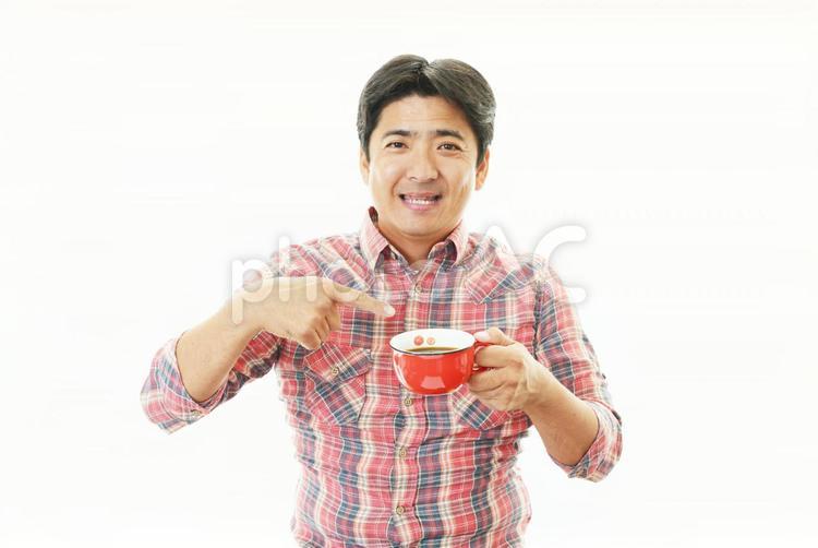 珈琲を飲み寛ぐ男性 コーヒー,男性,男の写真素材