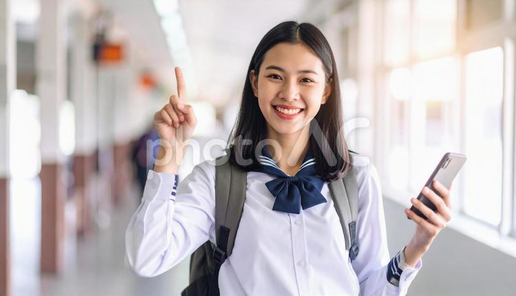 おすすめの指をさす人 女性,春,若者の写真素材