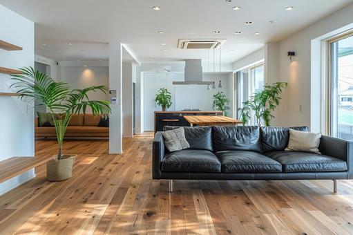 モダンな住宅のリビングとキッチン空間 モダンな住宅のリビングとキッチン空間 リビング,ソファ,テーブルの写真素材