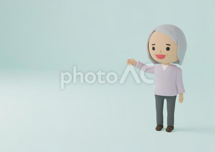 手を差し出し案内するお祖母さん お祖母ちゃん,女,クレイアートの写真素材