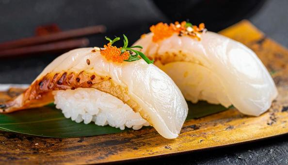 炙り鯛の握り寿司 炙り鯛の握り寿司の写真