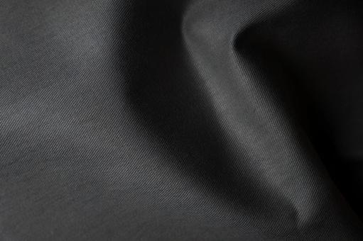 黒布の質感と陰影の写真