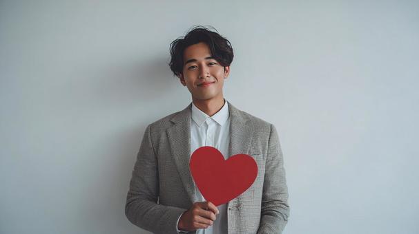 満面の笑みで愛を表現する男性 満面の笑みで愛を表現する男性の写真