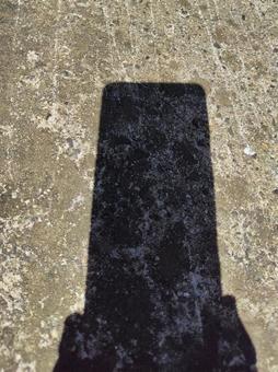 スマホの影 スマホの影の写真