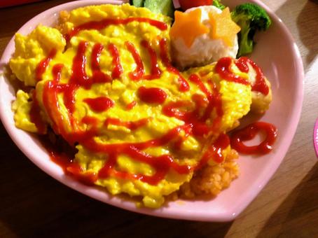 オムライス オムライス たまご,ケチャップ,トマトの写真素材