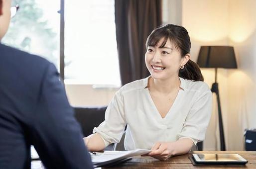 Asian female business woman explaining Asian female business woman explaining