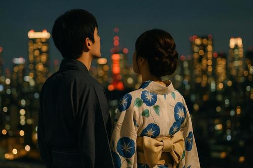 浴衣姿と東京タワーの夜景 浴衣姿と東京タワーの夜景の写真