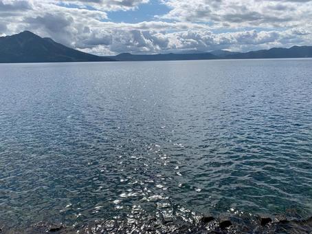 支笏湖の水面 支笏湖の水面 北海道,夏空,湖の写真素材