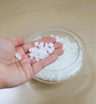 Beeswax in the palm of your hand, JPG