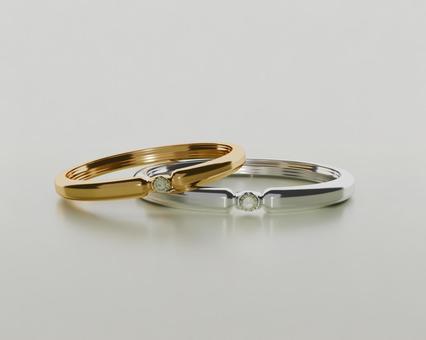 宝石が輝くペアリングの3DCG 宝石が輝くペアリングの3DCG 結婚指輪,指輪,リングの写真素材