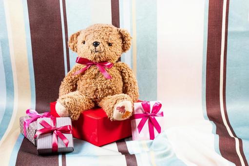 ストライプ布背景のテディベア テディベア,ぬいぐるみ,クマの写真素材