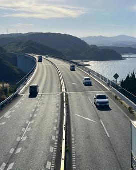 高速道路 ハイウェイ,高速道路,トラックの写真素材